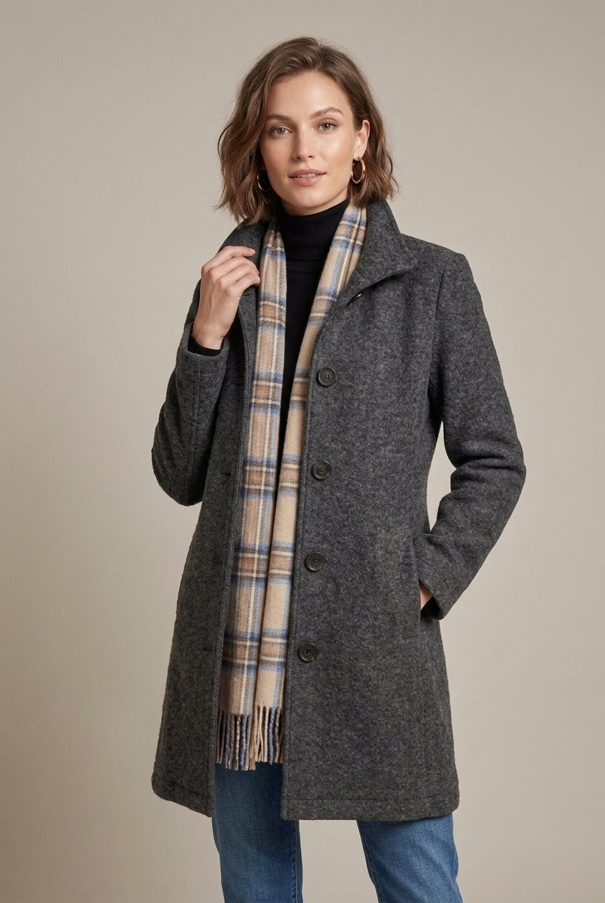 Elegant mid-length wool coat by Lumina Wear featuring a notch collar and button front, displayed on a stylish model.