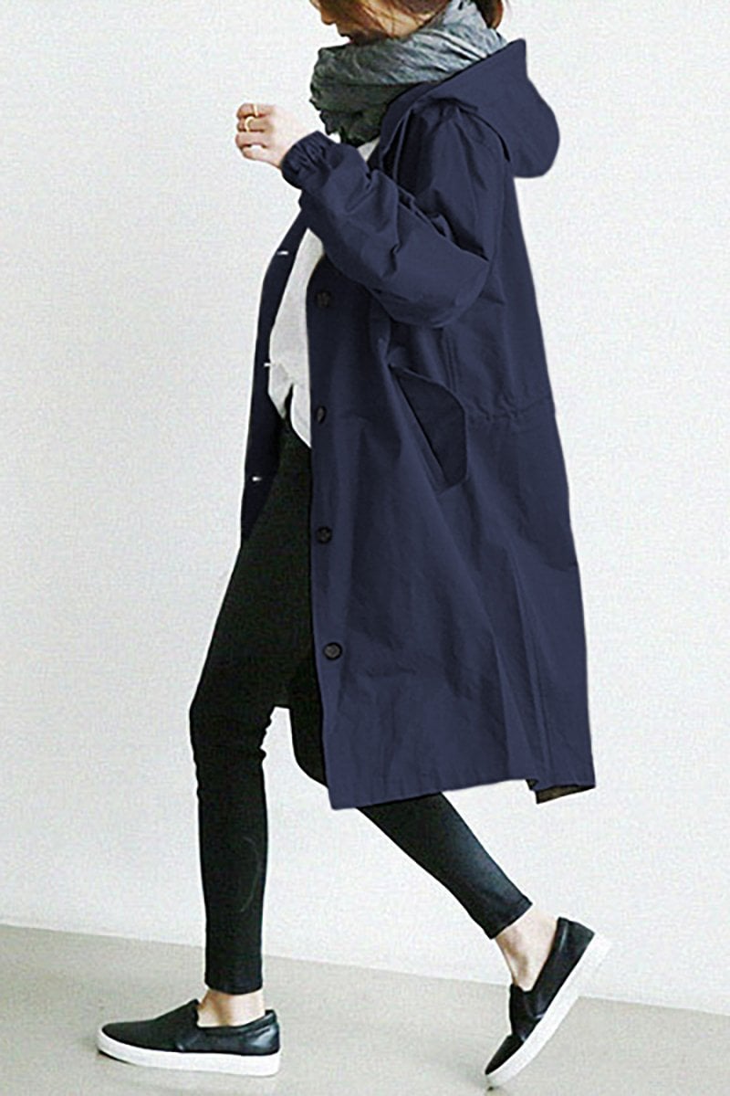 Turquoise hooded longline winter coat with patch pockets
