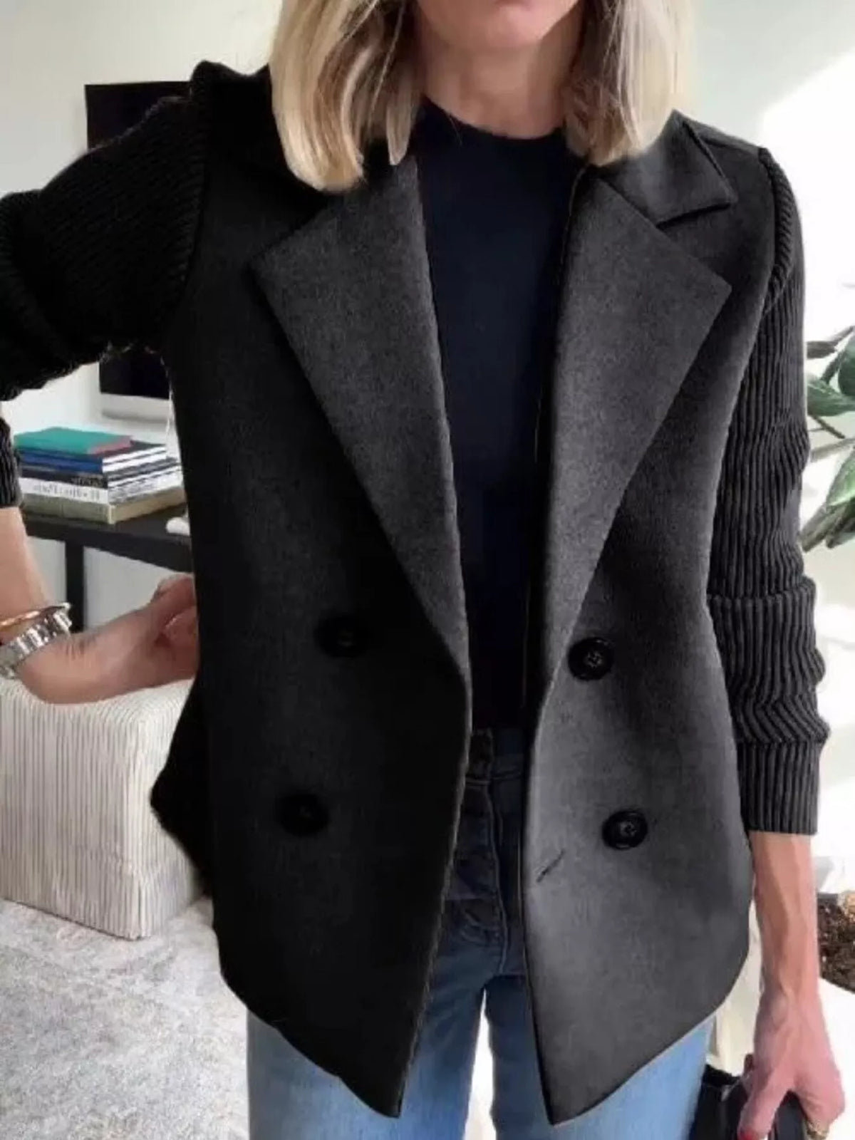 Black double breasted short coat with shawl collar and knit cuffs