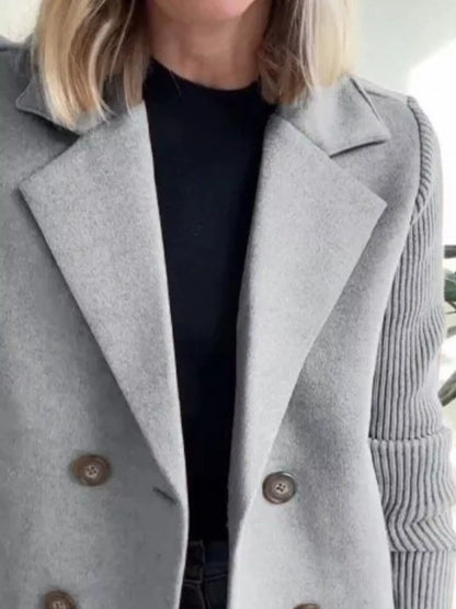 Grey double breasted short coat with shawl collar and knit cuffs