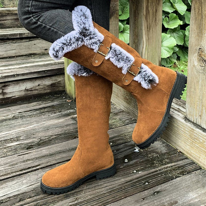 Black knee high boots featuring plush faux fur trim and adjustable buckle straps, perfect for women seeking stylish and warm long boots for cold weather. 4