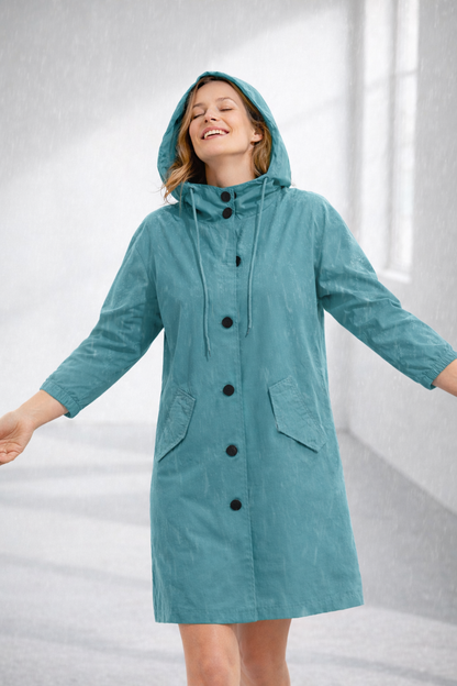 Turquoise hooded longline winter coat with patch pockets