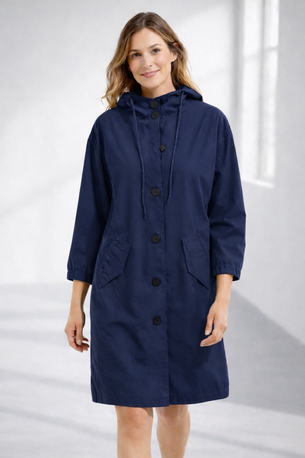 Navy hooded longline winter coat with patch pockets