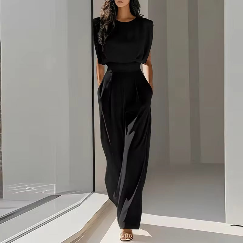 SLEEVELESS ROUND NECK JUMPSUIT WITH BELT 1