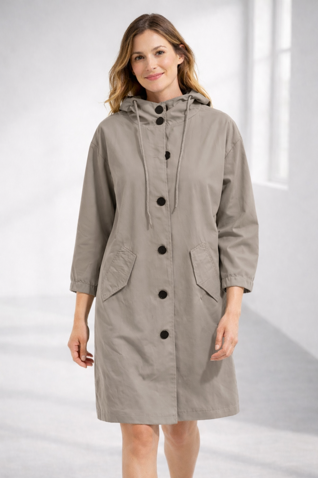 Beige hooded longline winter coat with patch pockets