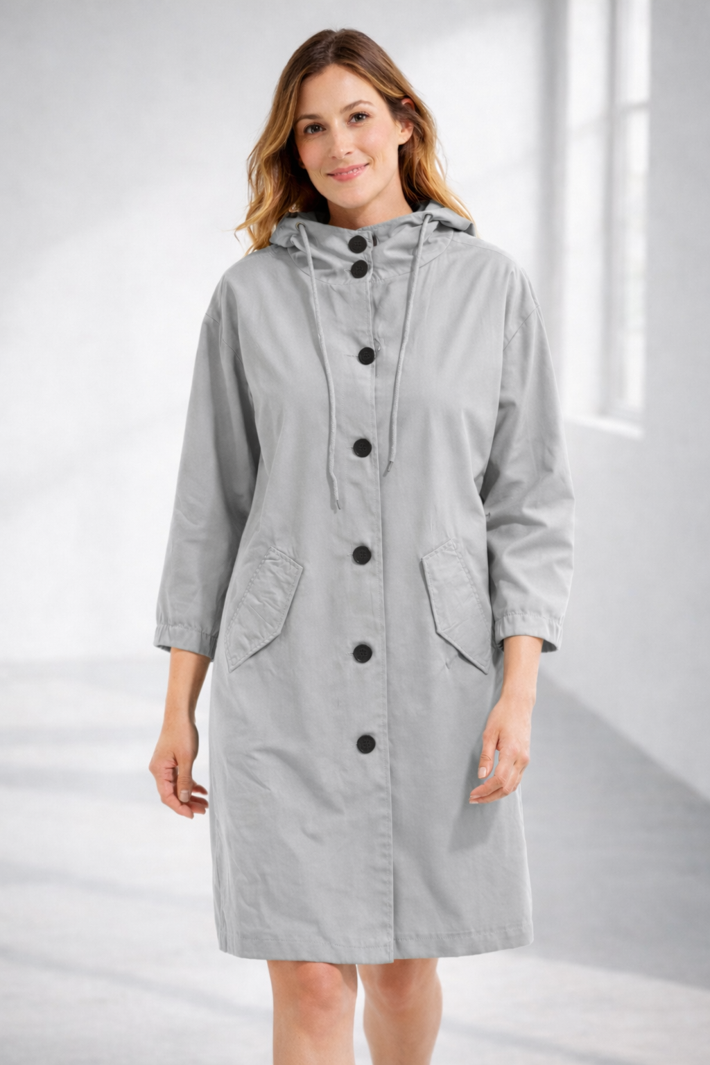 Grey hooded longline winter coat with patch pockets