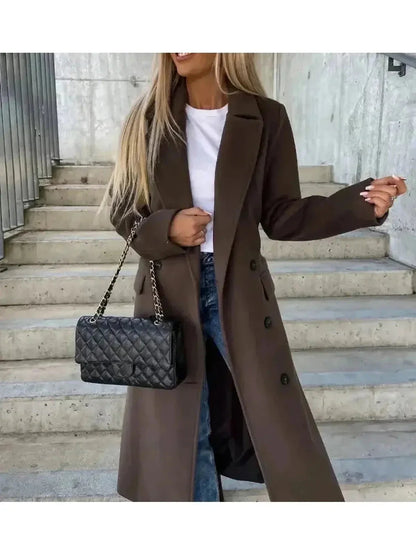 Beige Lumina Wear Kim double-breasted wool coat displayed on a hanger, featuring a stylish, elegant design.
