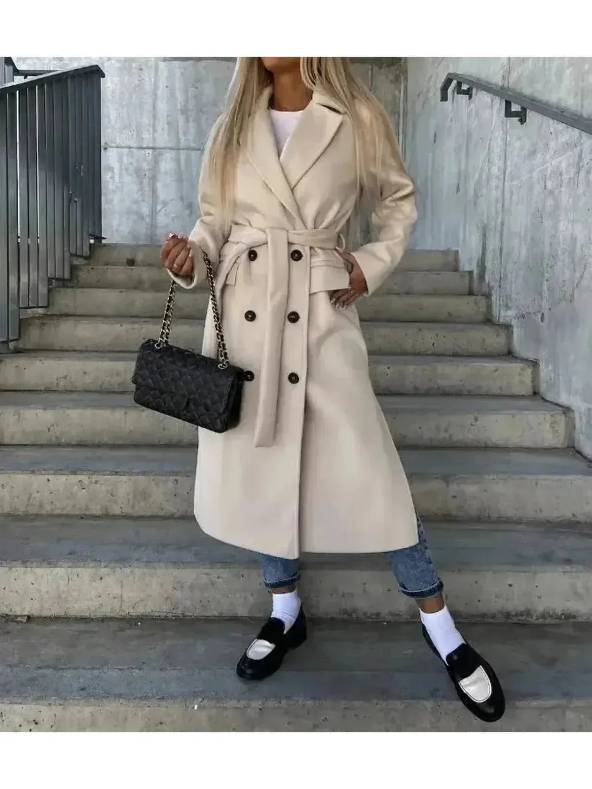 Lumina Wear Kim beige double-breasted wool coat, elegant and stylish, displayed on a hanger with a clean background.