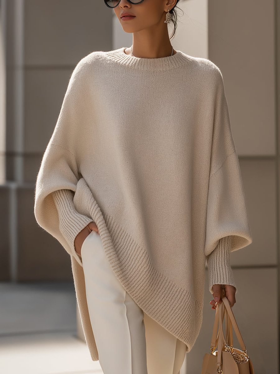 Oversized knit poncho jumper with batwing sleeves, front view