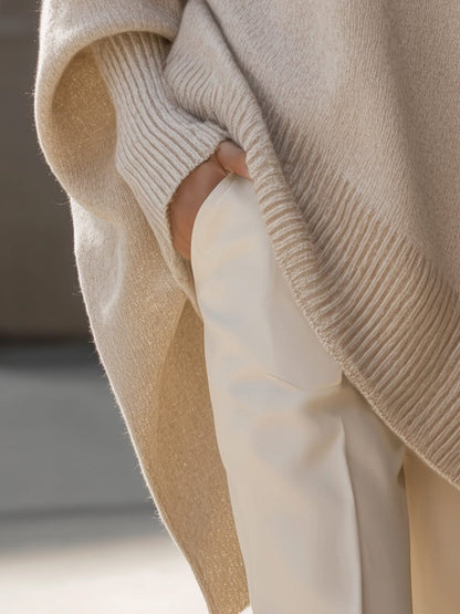 Oversized knit poncho jumper with batwing sleeves
