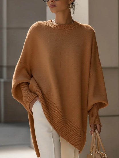 Oversized knit poncho jumper with batwing sleeves