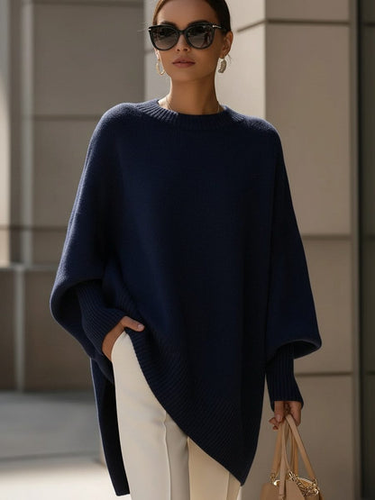 Oversized knit poncho jumper with batwing sleeves