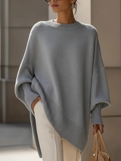 Oversized knit poncho jumper with batwing sleeves