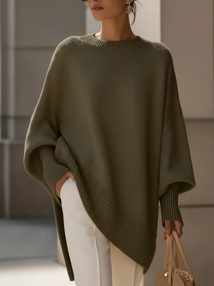 Oversized knit poncho jumper with batwing sleeves