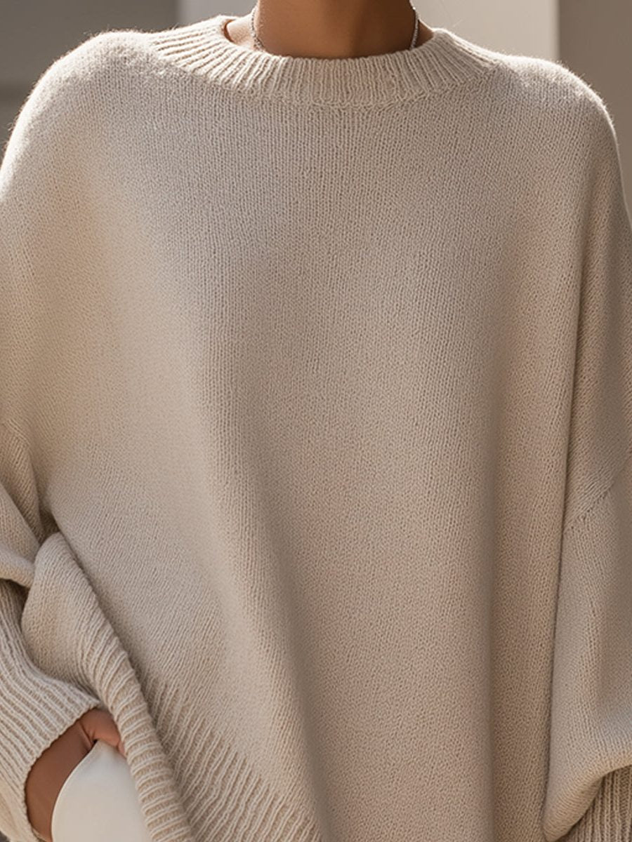 Oversized knit poncho jumper with batwing sleeves