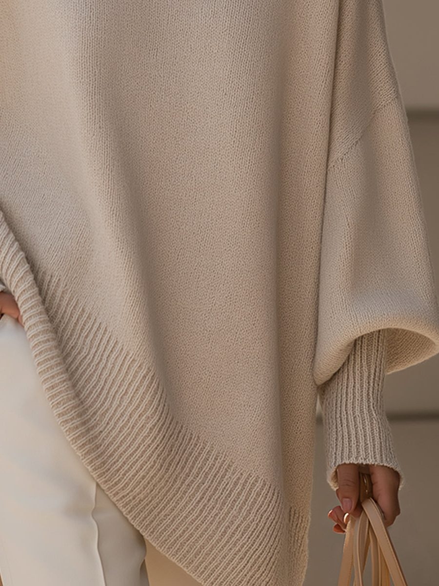 Oversized knit poncho jumper with batwing sleeves