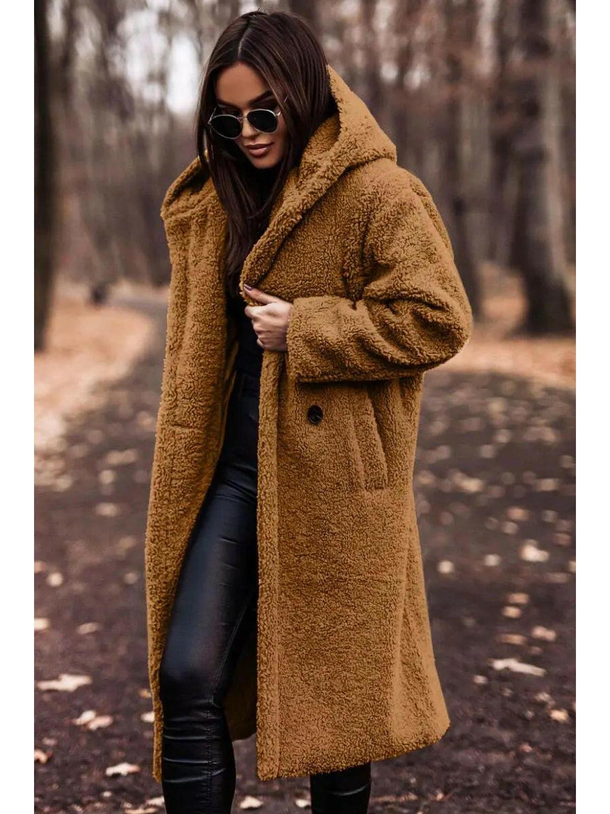Beige Carol winter cozy coat by Lumina Wear, shown on a model with a high collar and warm, plush fabric for cold weather.