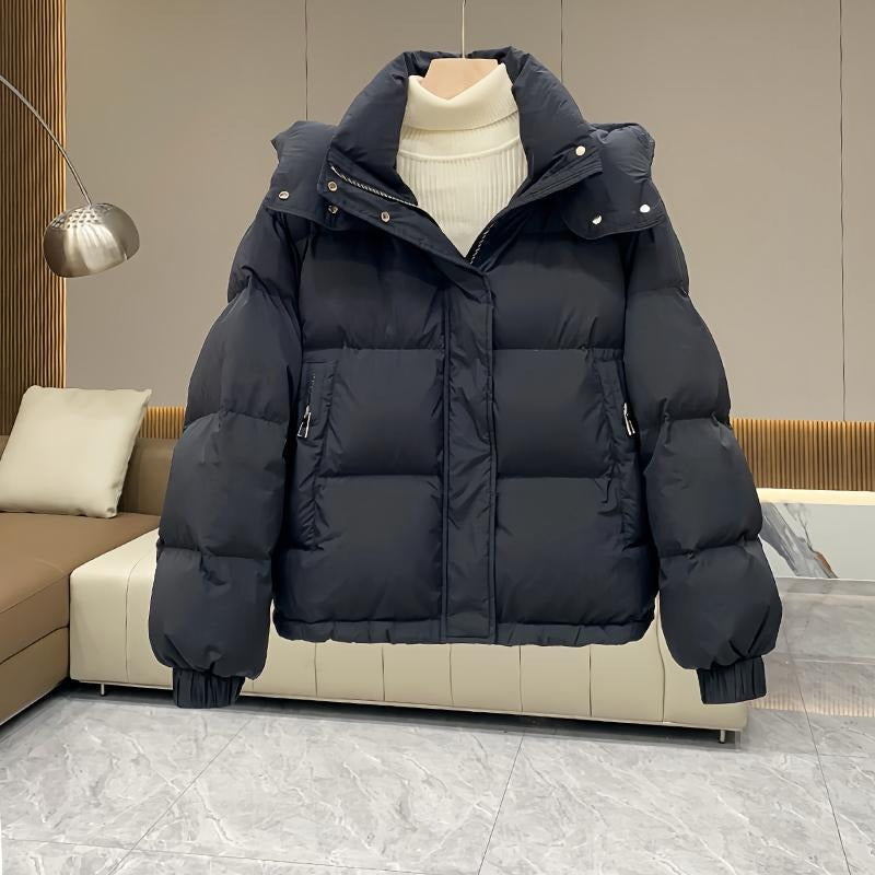 High neck quilted hooded puffer jacket with a high neck design